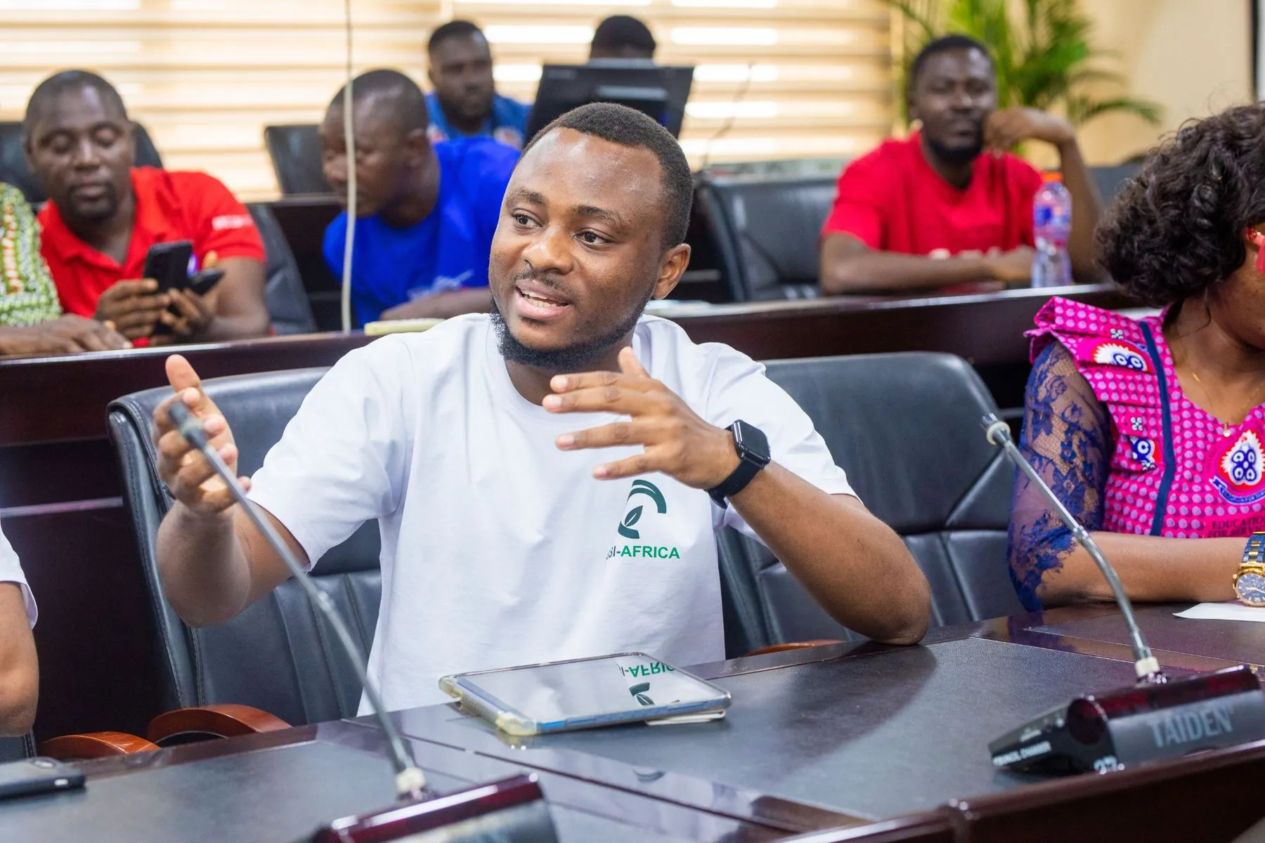 A GSI team member speaking at the launch meeting with UEW staff